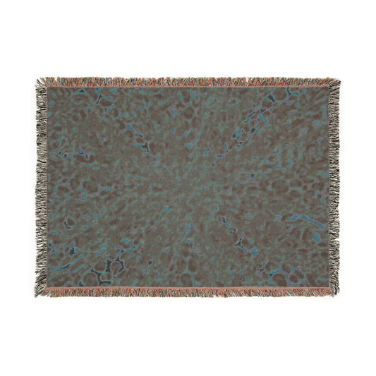 Manta tejida artística: decoración acogedora con estampados únicos para un hogar con estilo